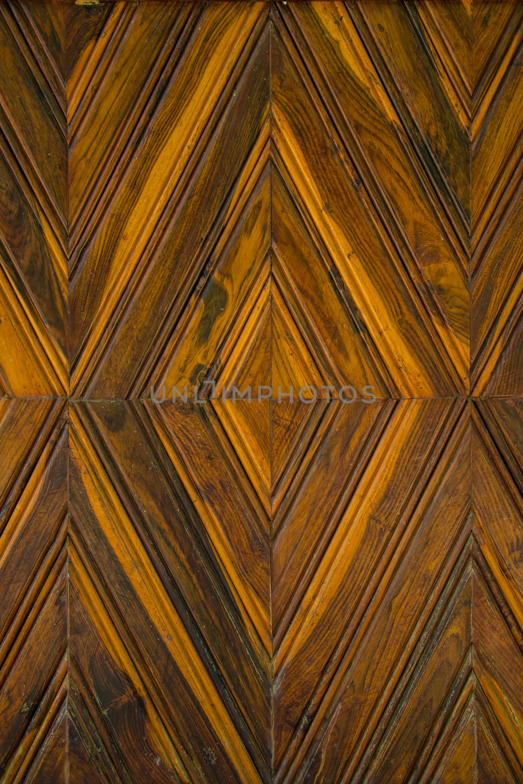 Pattern squares on a wooden wall, Background.