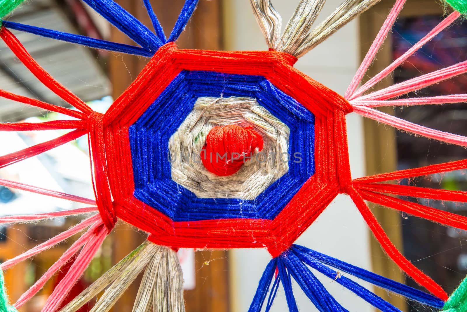 Thread colors to be made into a spider's web.