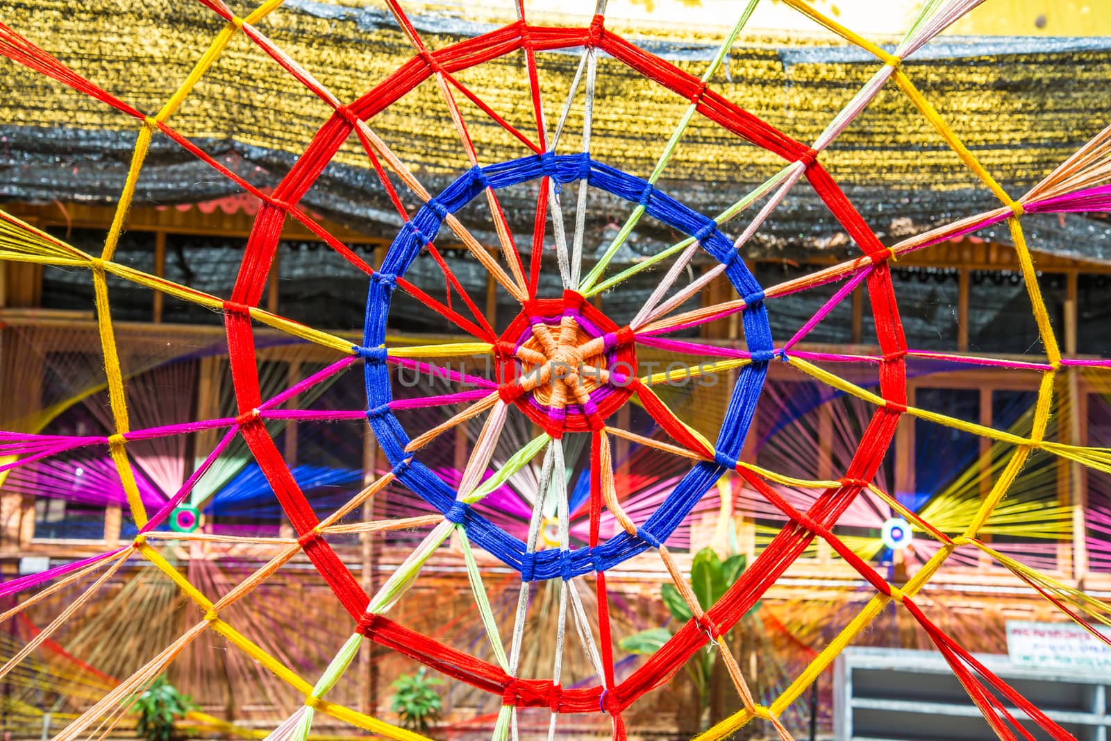 Thread colors to be made into a spider's web.
