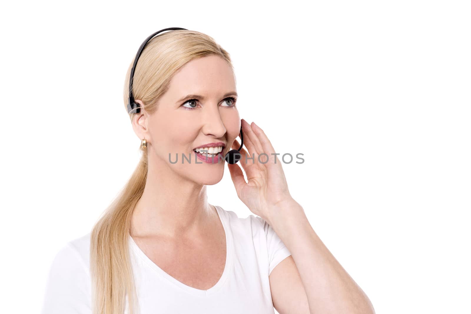 Portrait of cheerful woman with headset