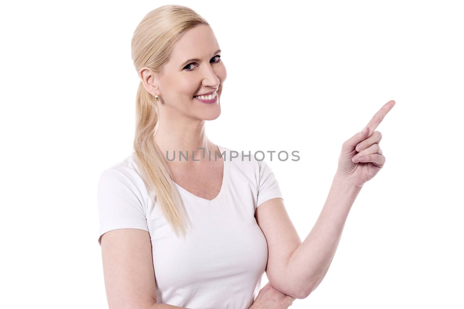 Trendy woman pointing her finger at something