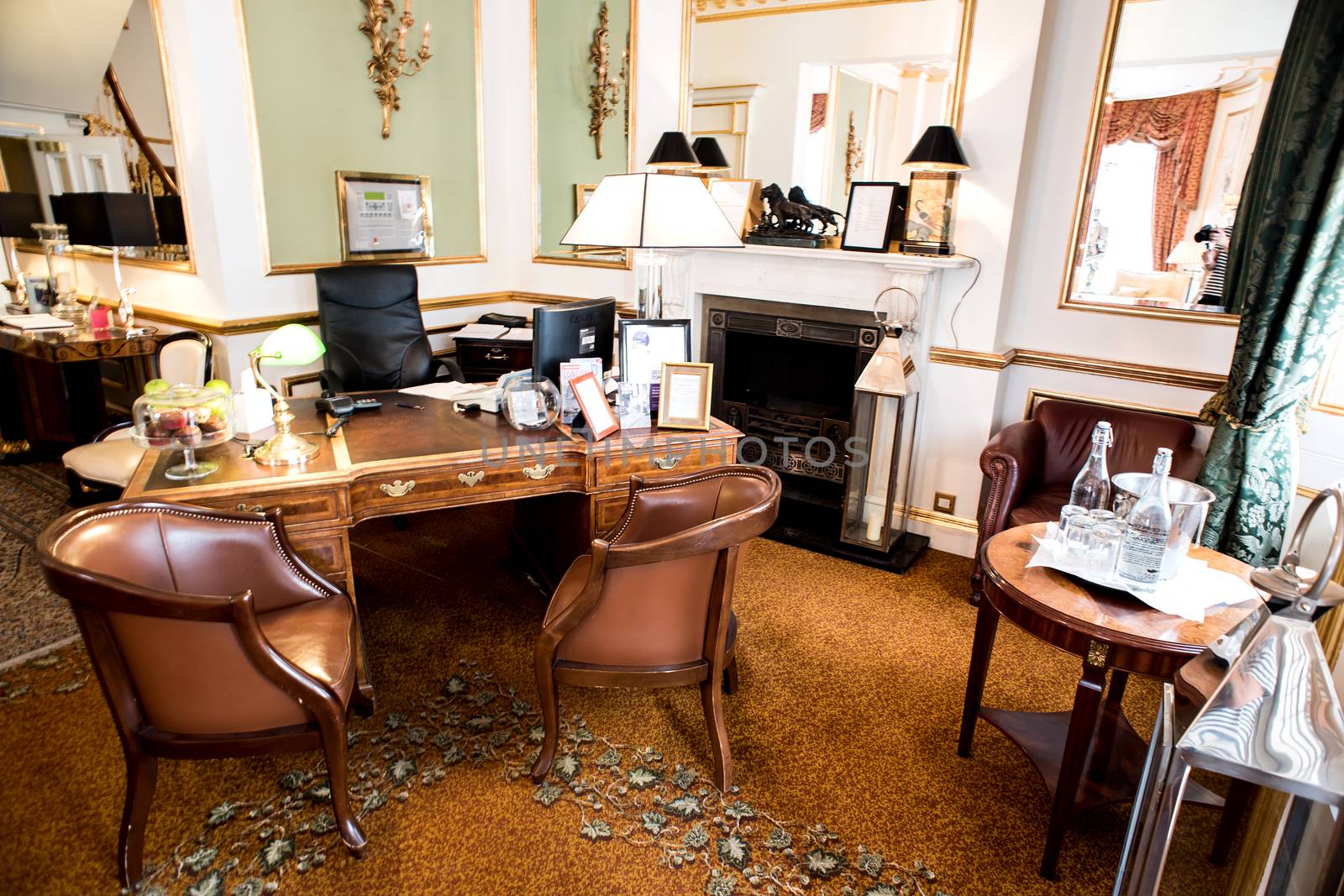 Hotel  lobby with a reception desk by stockyimages