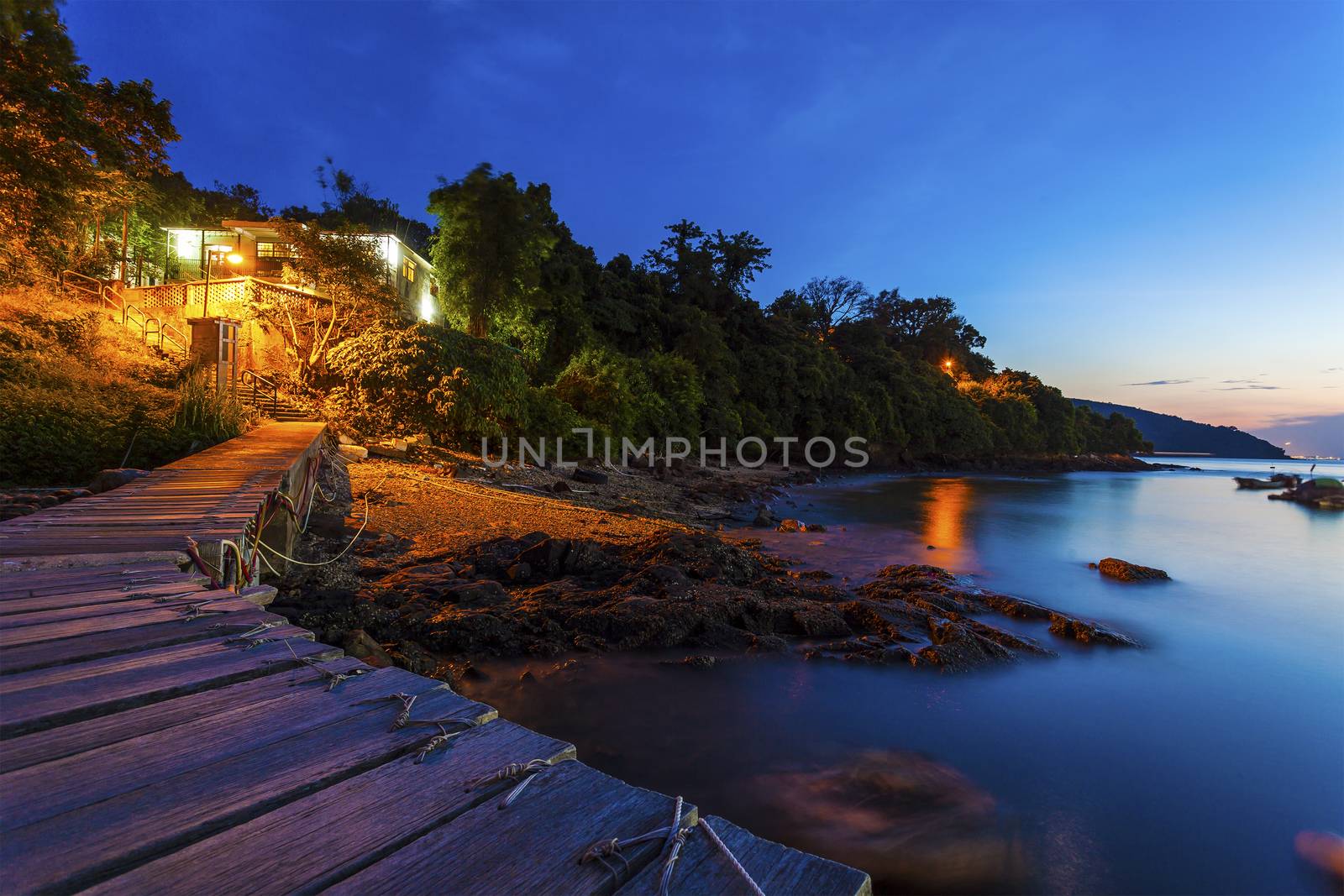 Houses along coast on a wooden bridge