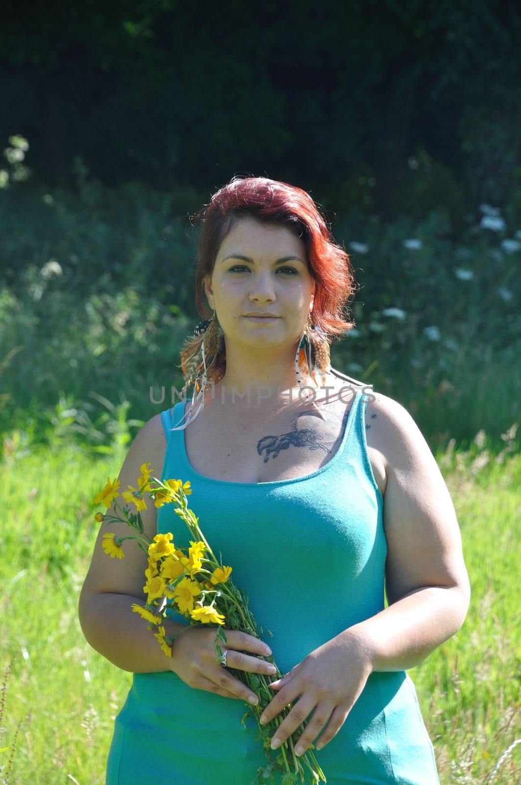 Woman in a meadow with flowers