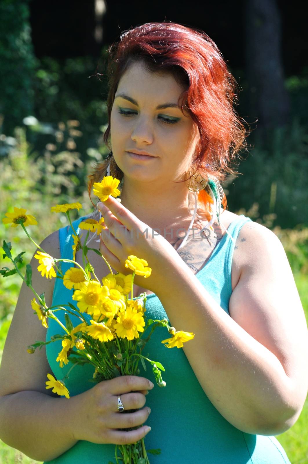 Woman in a meadow with flowers