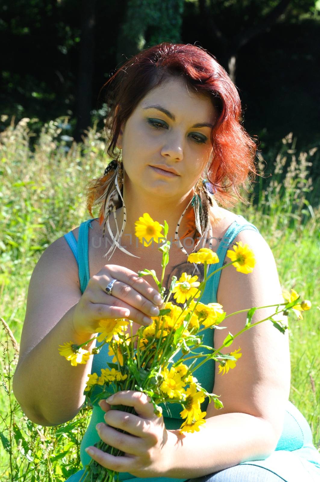 Woman in a meadow with flowers
