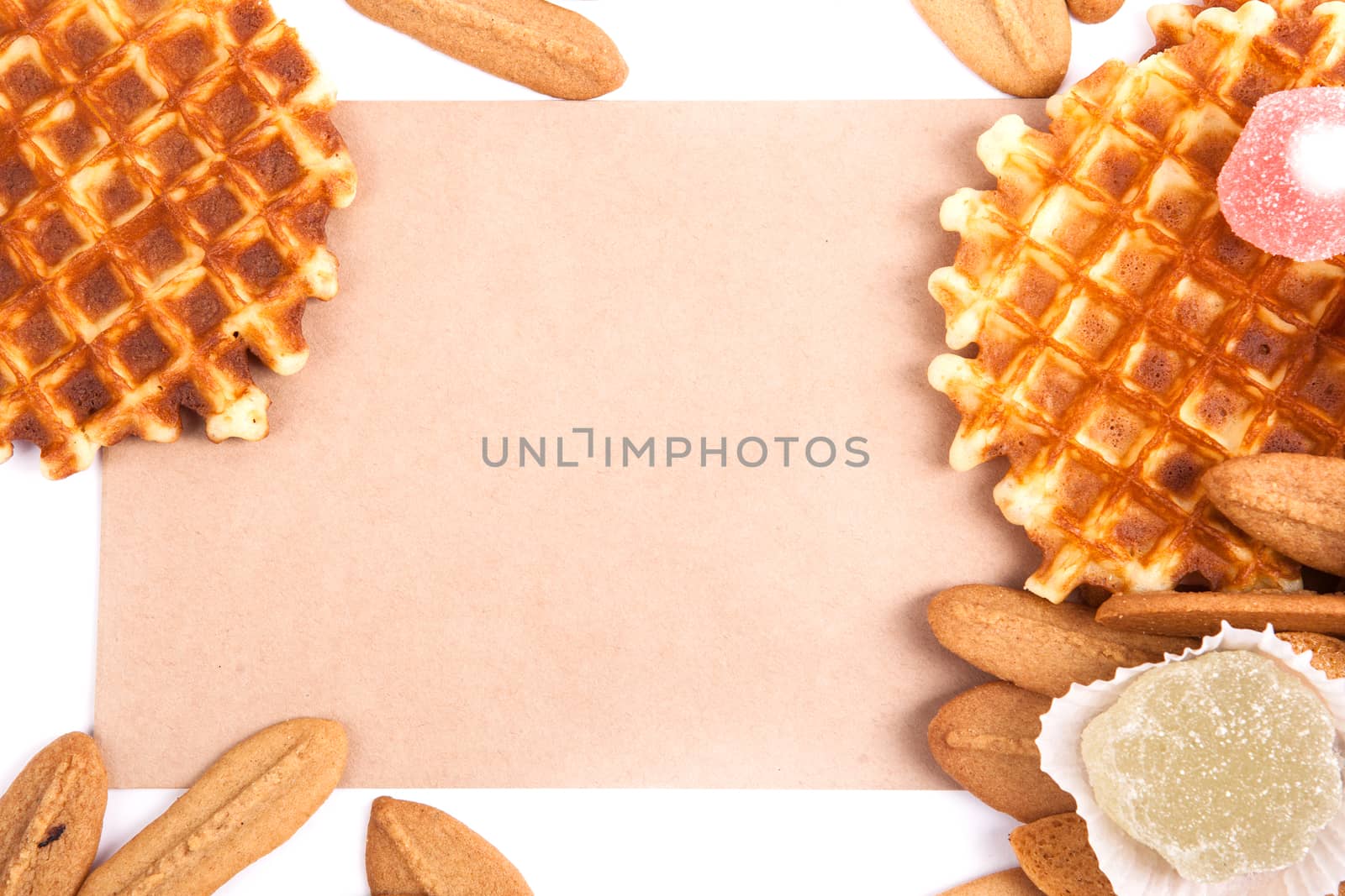 background biscuits, waffles, fruit jelly isolated on white background with space for text on the envelope