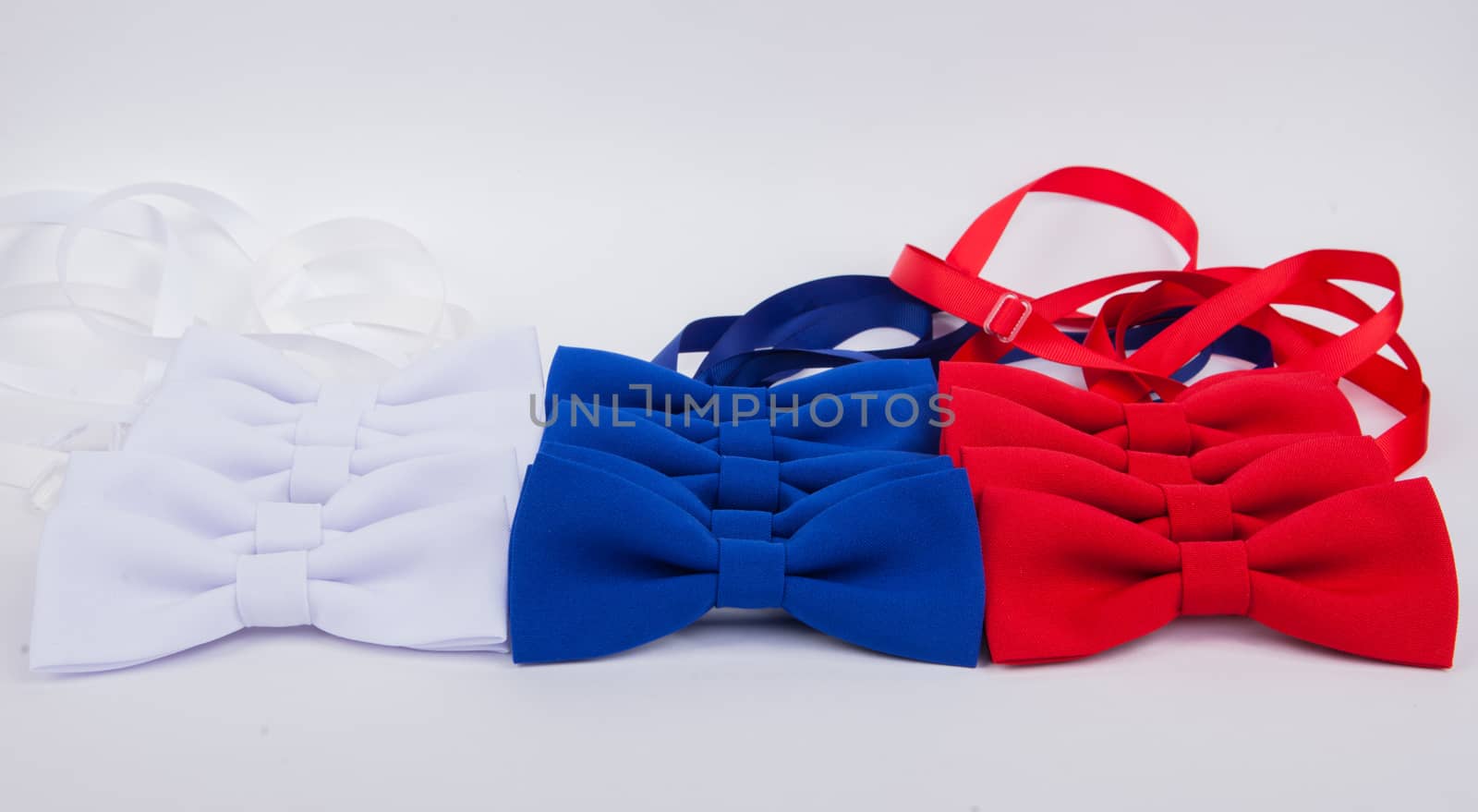 white, blue and red bow tie isolated on white background