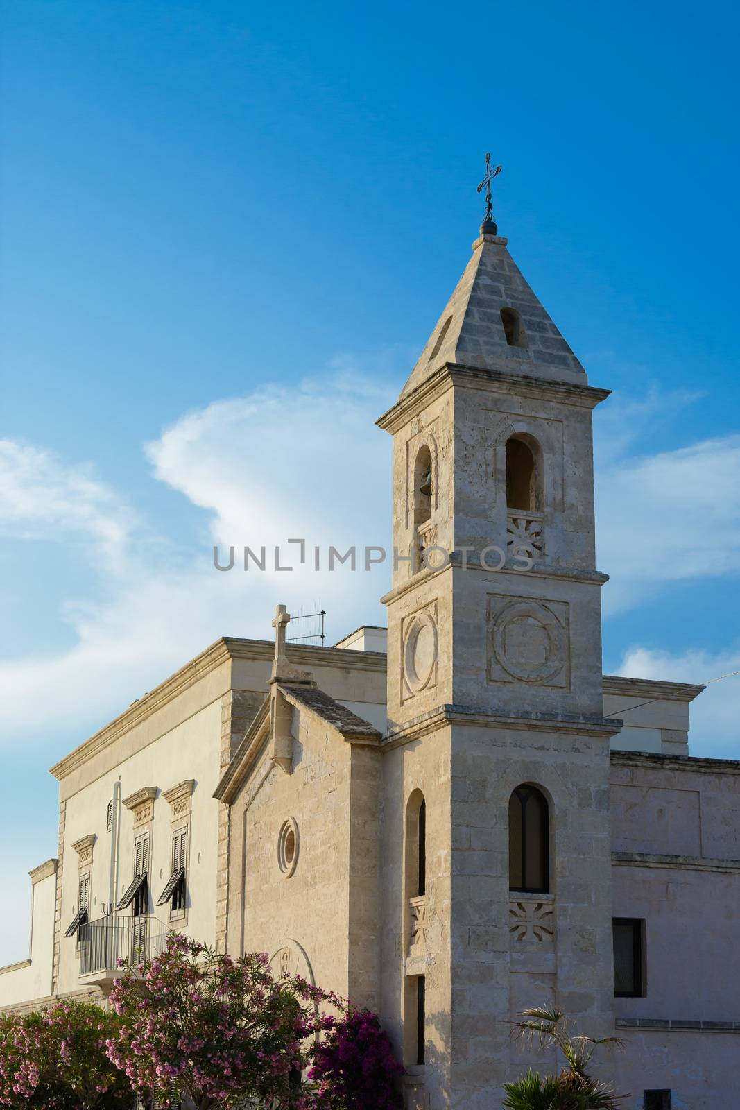 Bell tower of the church with a beautiful blue sky