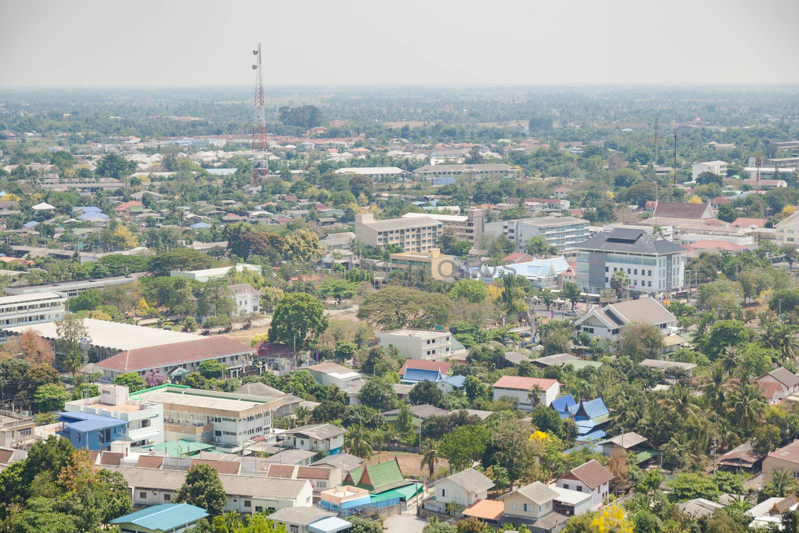 Buildings and towers in Phetchaburi taken from a high angle panoramic view of the city.