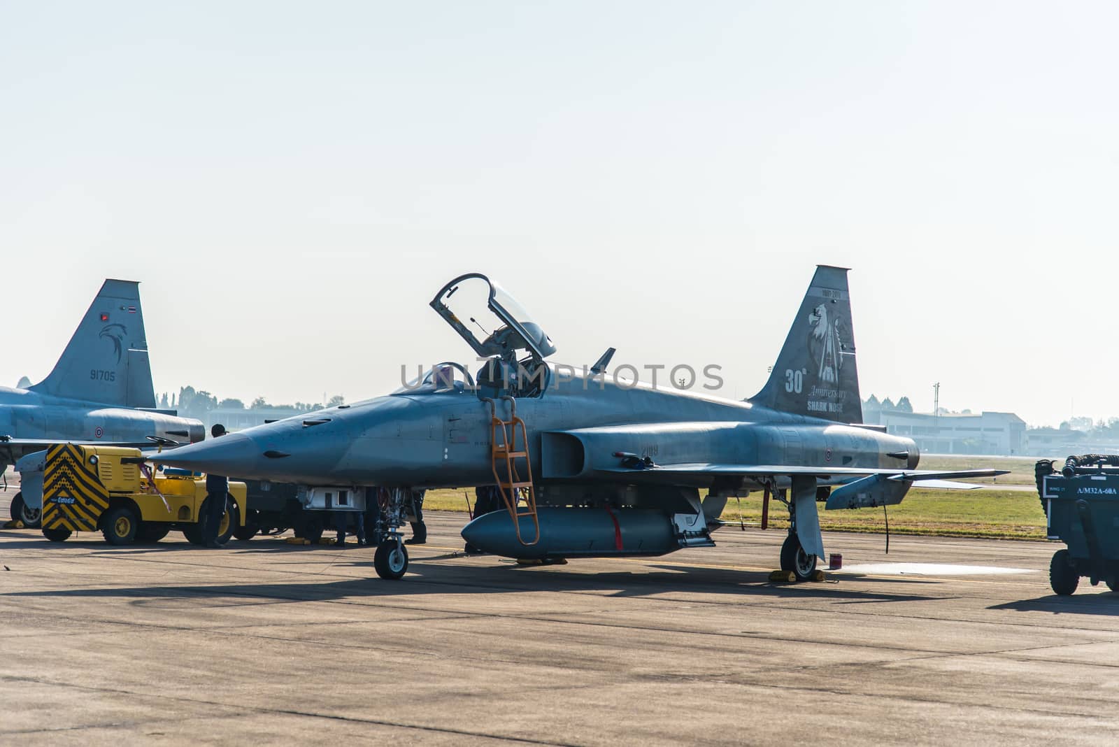 Fighter aircraft parked on the apron.