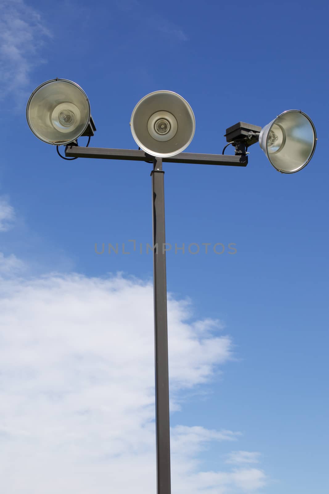 Isolated Outdoor Athletic Court Lights Against The Sky