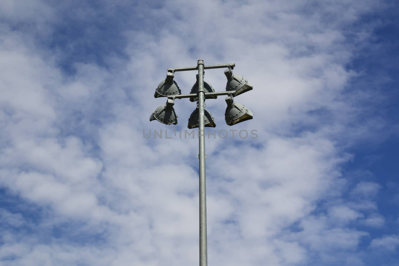 Isolated Outdoor Athletic Court Lights Against The Sky