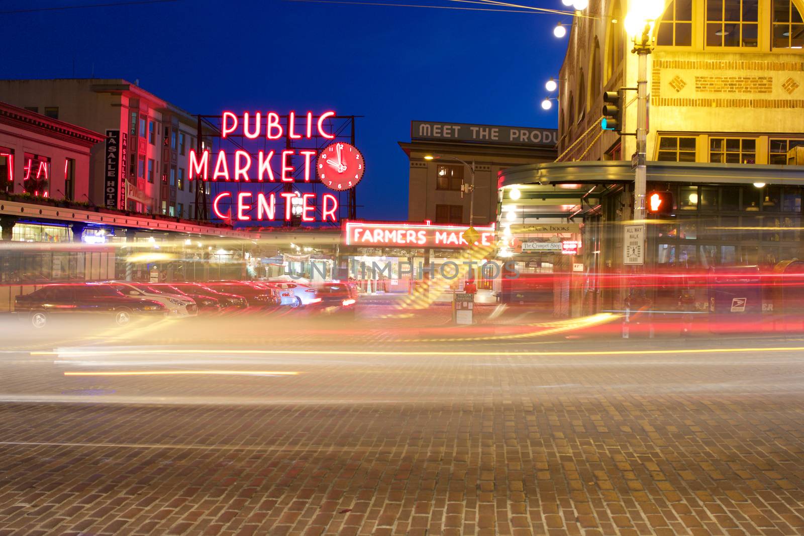 Seattle, WA - July 24, 2015 - Pike Place Public Market Center Sign at Night with Light Trails