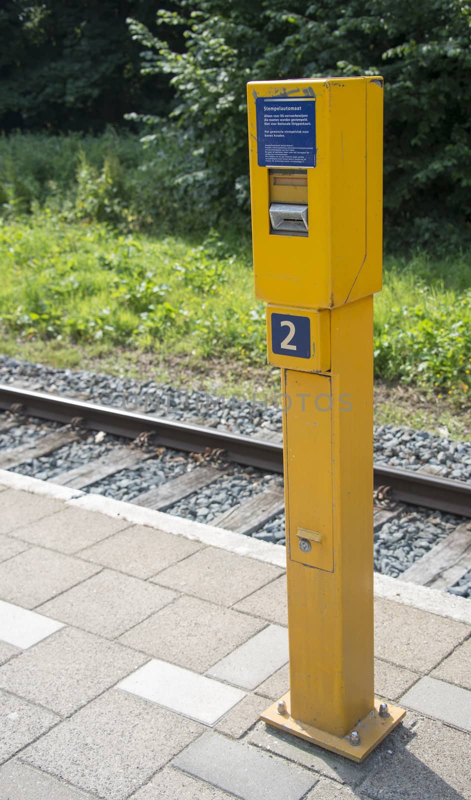 old train ticket stamping machine in holland for the old paper cards