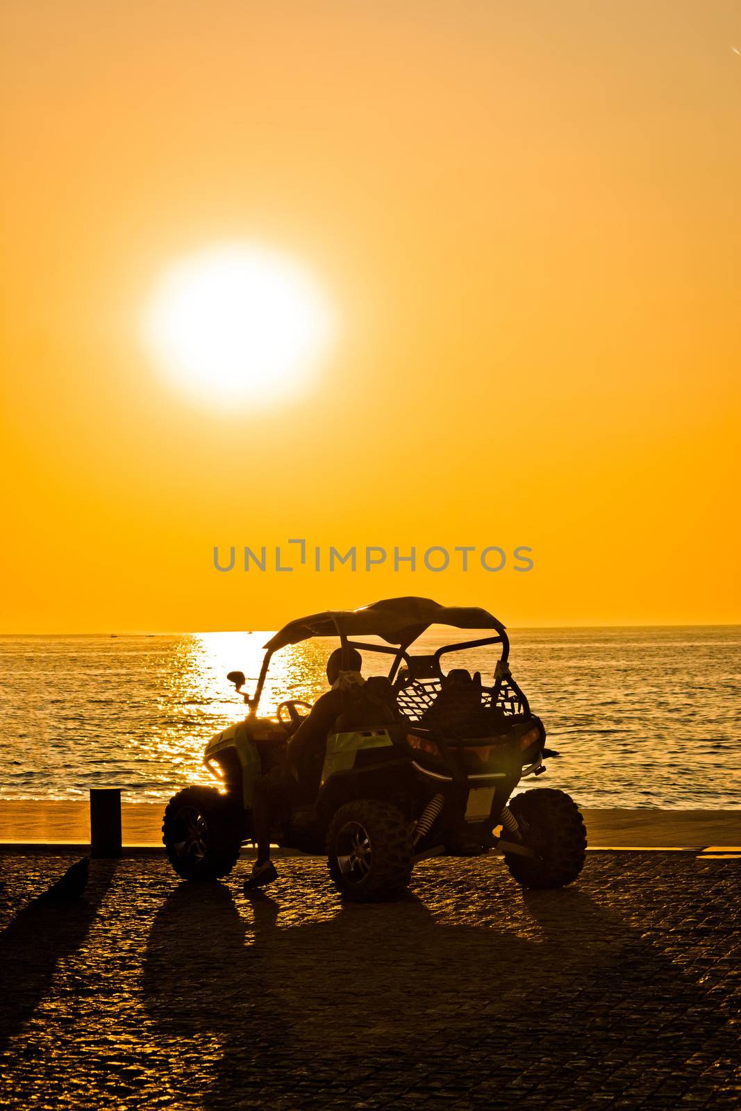 Quad motorbike by the sea at sunset by xbrchx