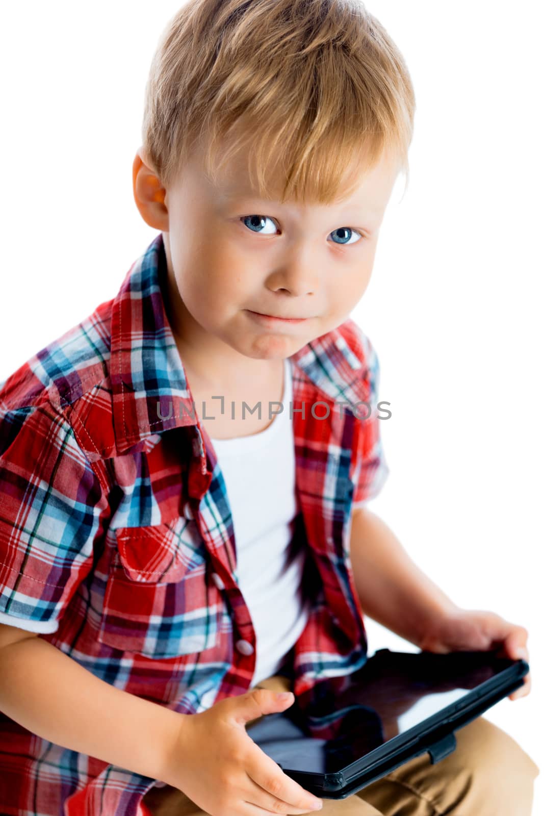 boy in a plaid shirt with a tablet computer by pzRomashka