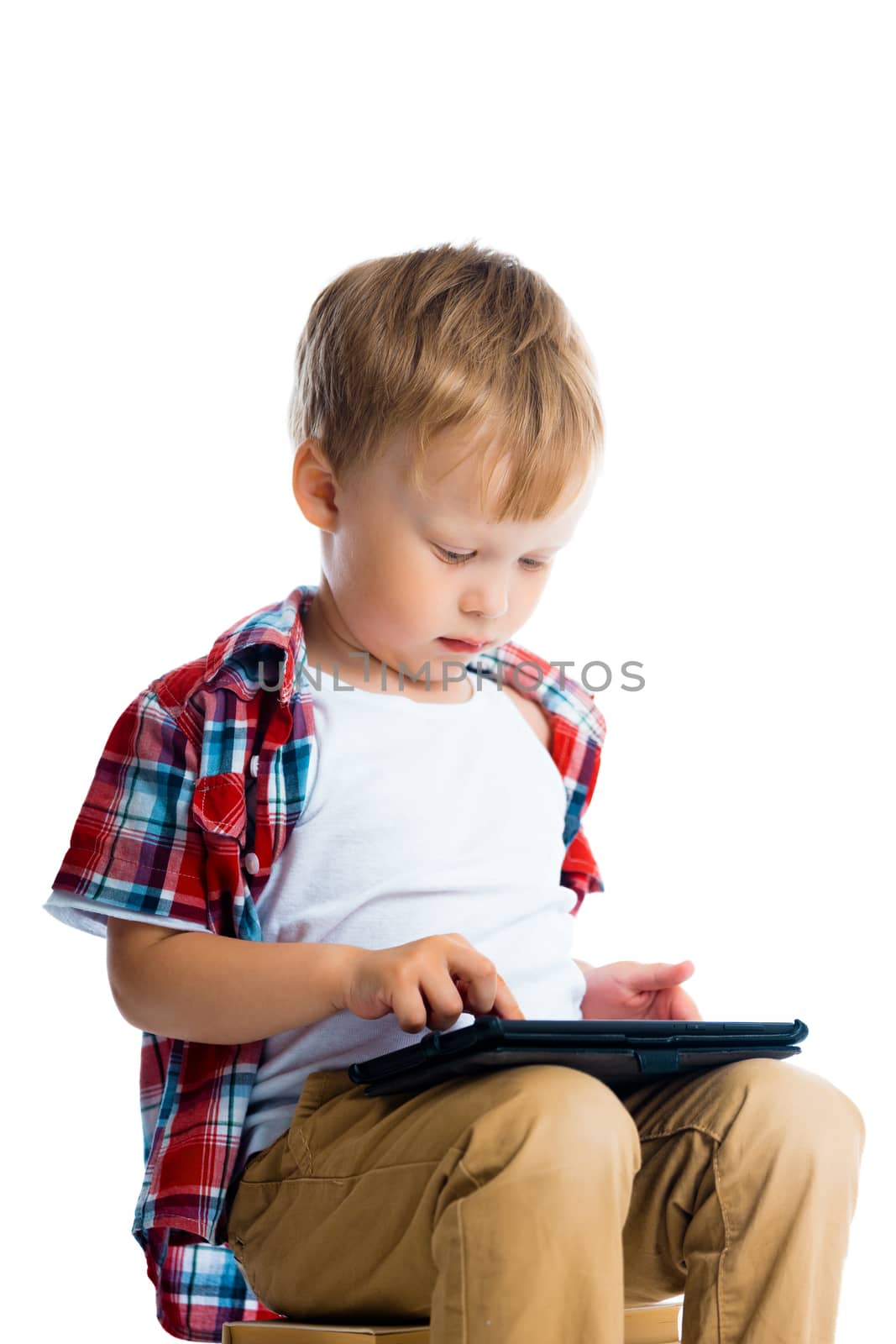 boy in a plaid shirt with a tablet computer by pzRomashka