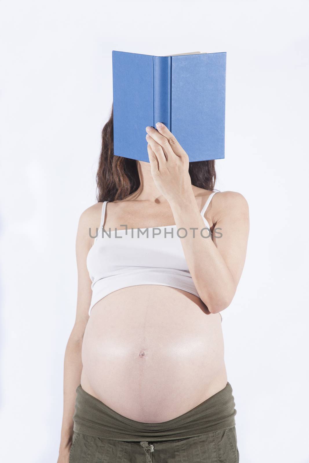 pregnant reading blue book by quintanilla