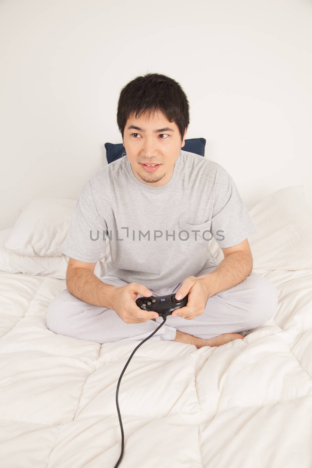 Man playing video games by ifilms
