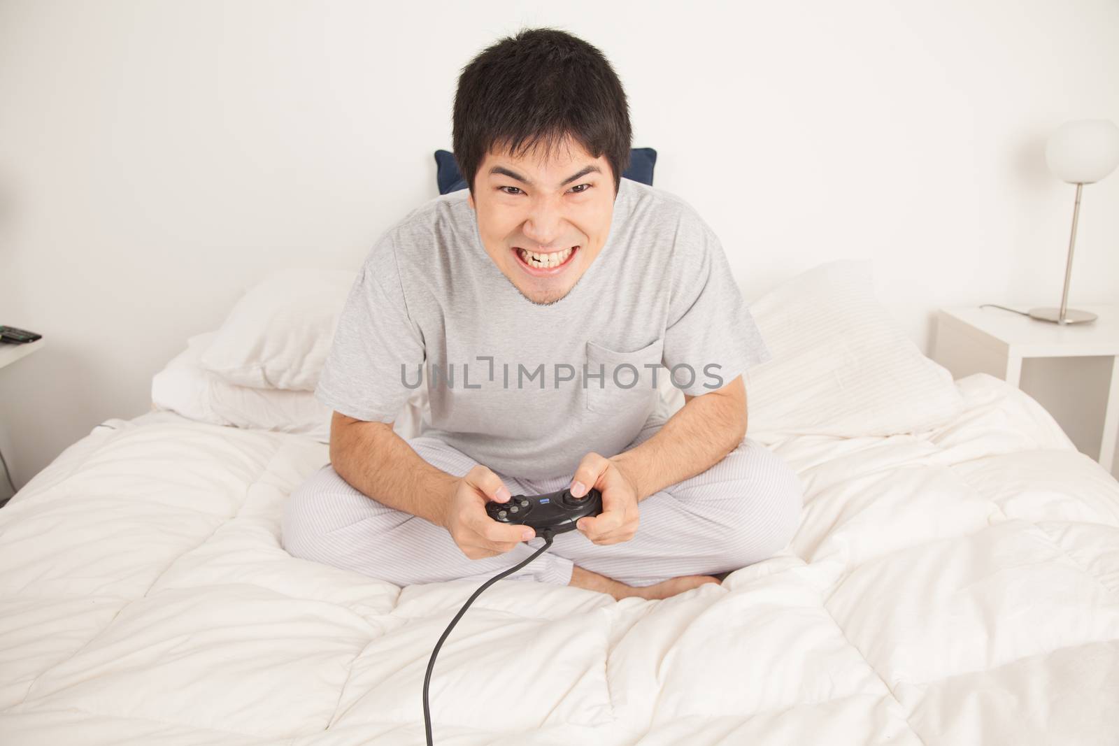 Man playing video games and shouting by ifilms