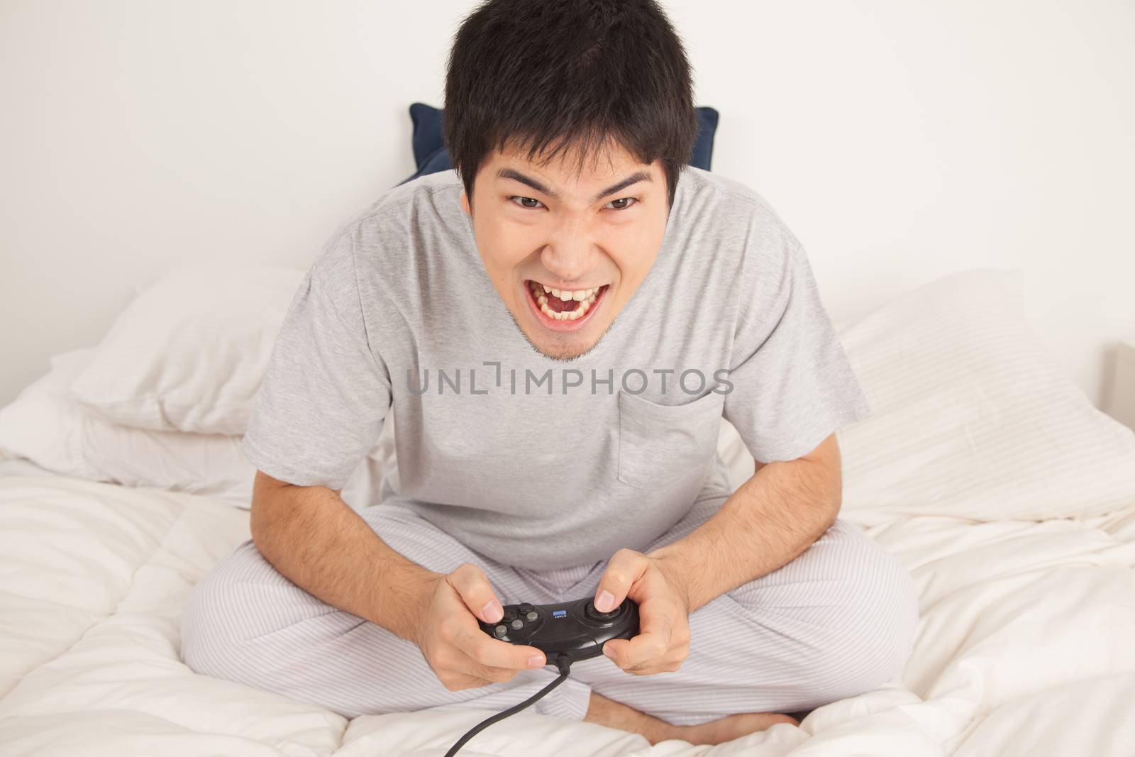 Man playing video games and shouting
