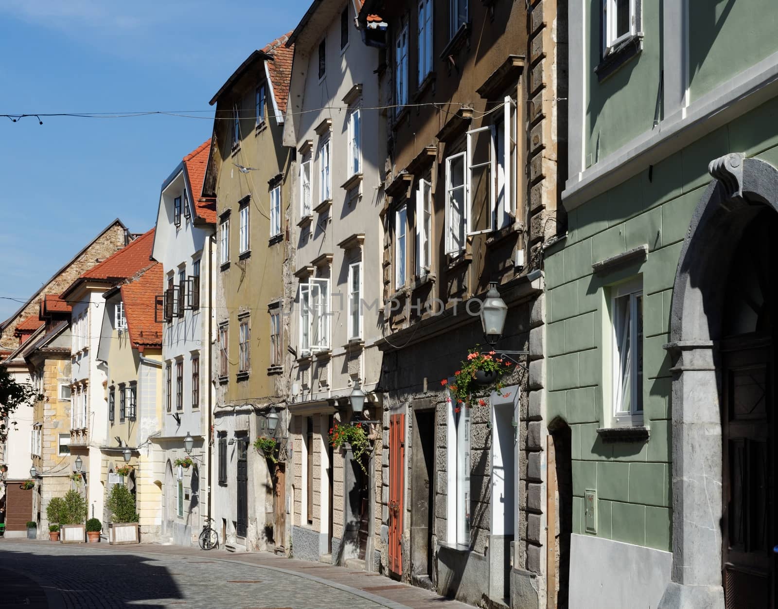 Old street in European town converging in perspective