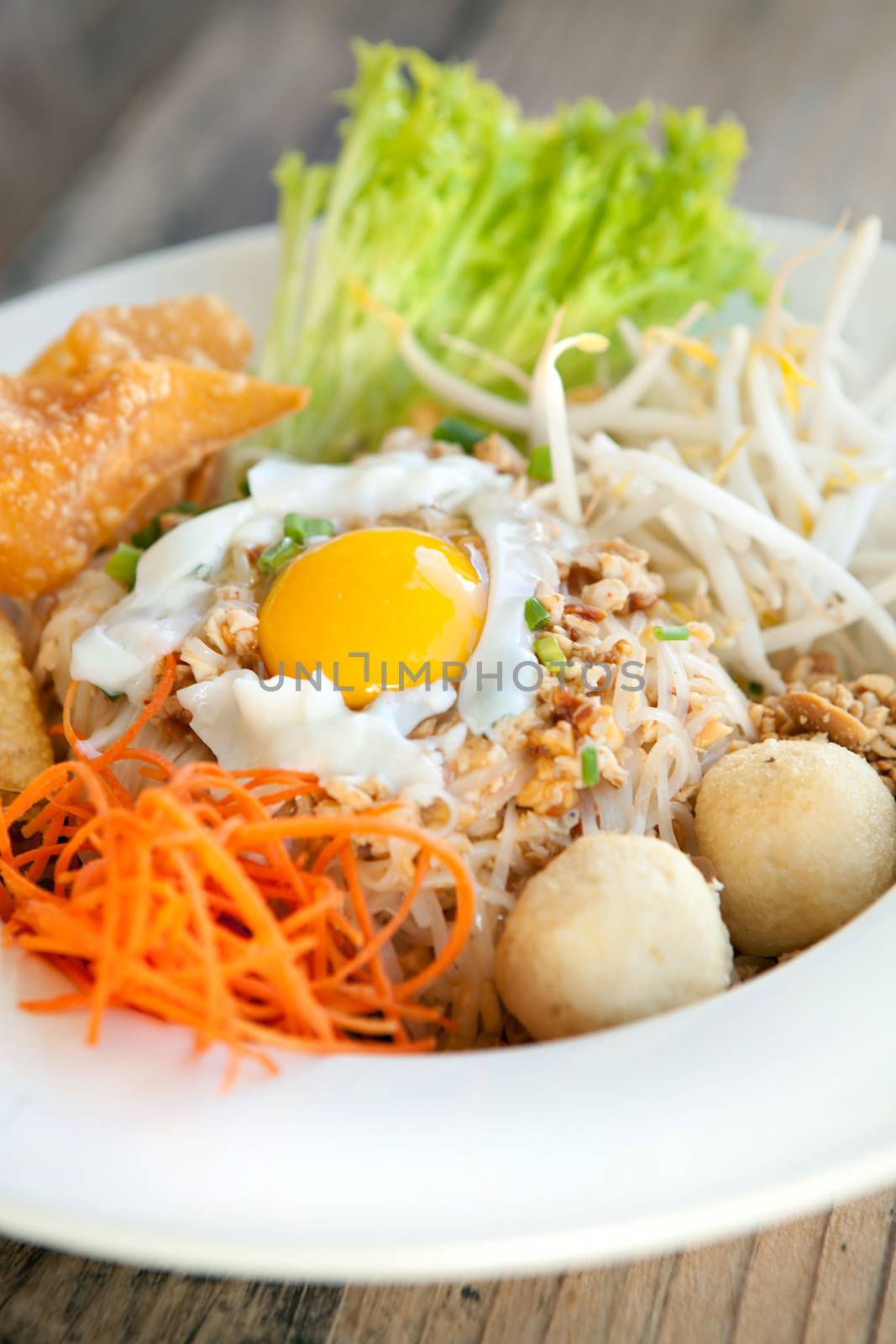 Thai Noodle Dish with Fried Egg by graficallyminded