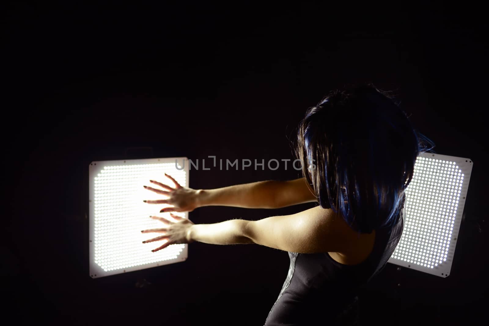 Photo of a cyberpunk woman silhouette. Taken in Riga, Latvia.