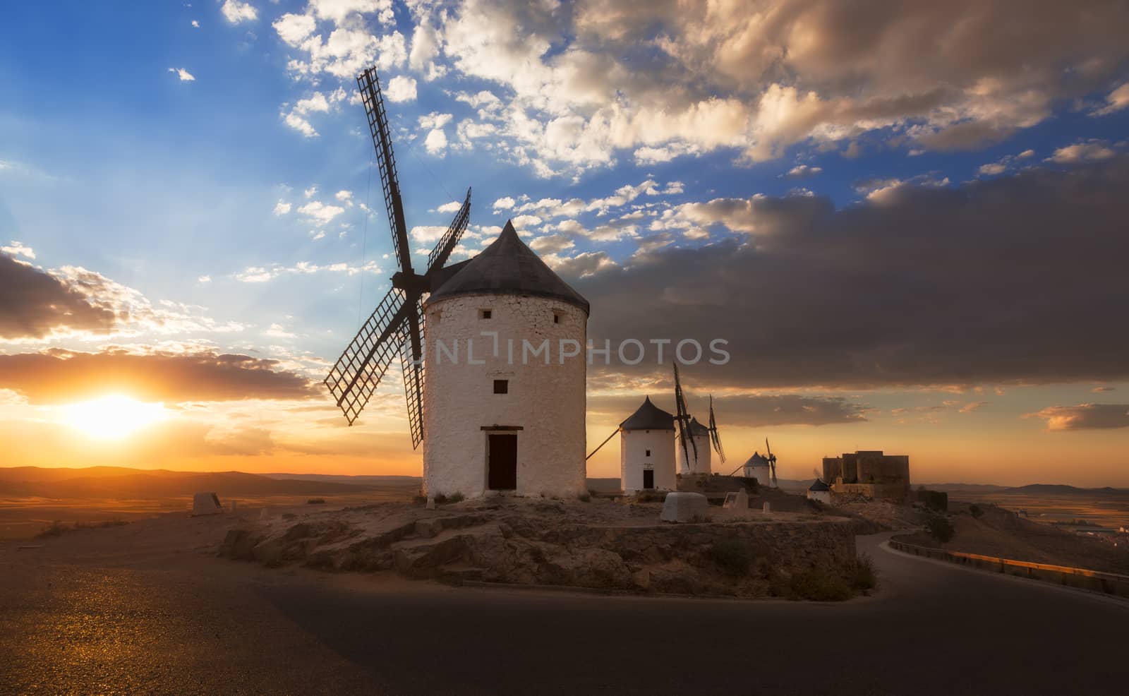 Windmills at sunset, Consuegra, Castile-La Mancha, Spain by fisfra