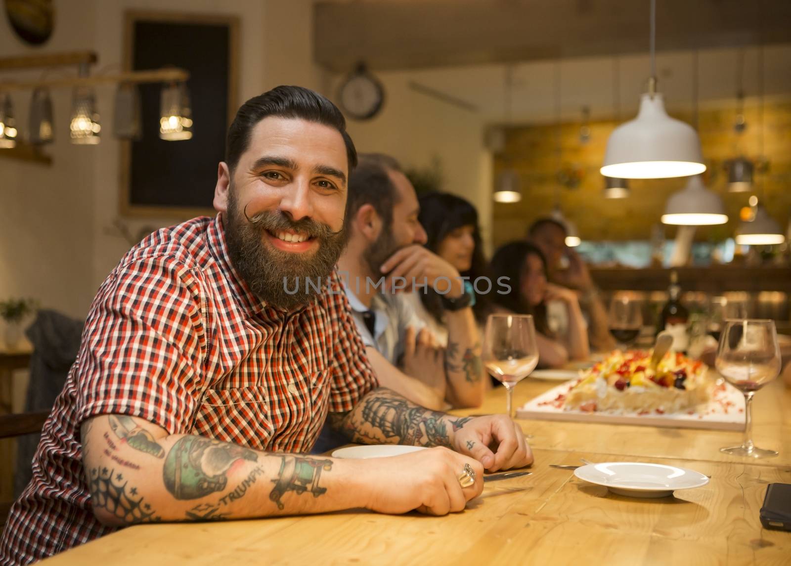 Multi-ethnic group of friends dinner at the restaurant