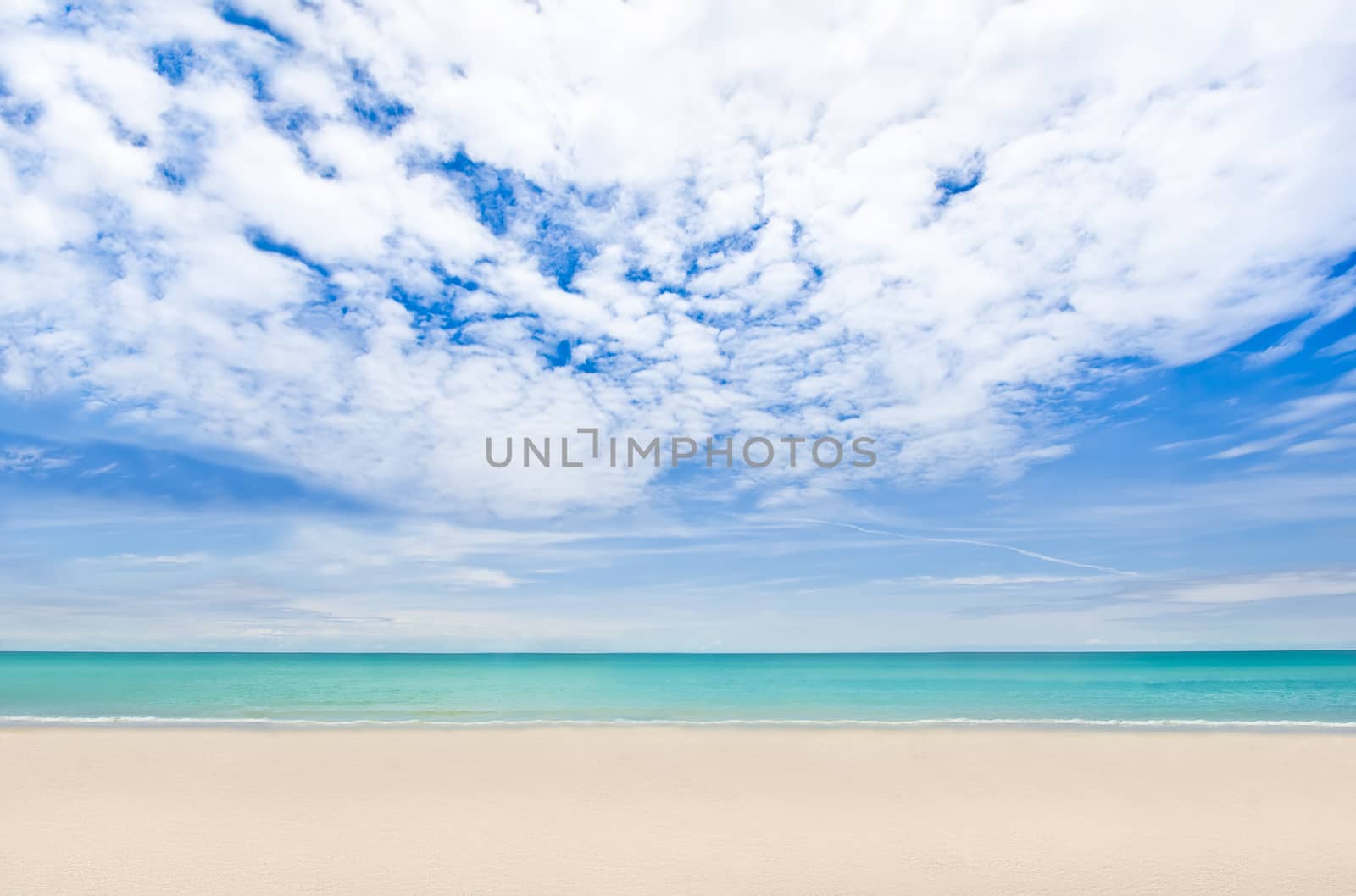 White sand and blue sky overlooking Andaman sea