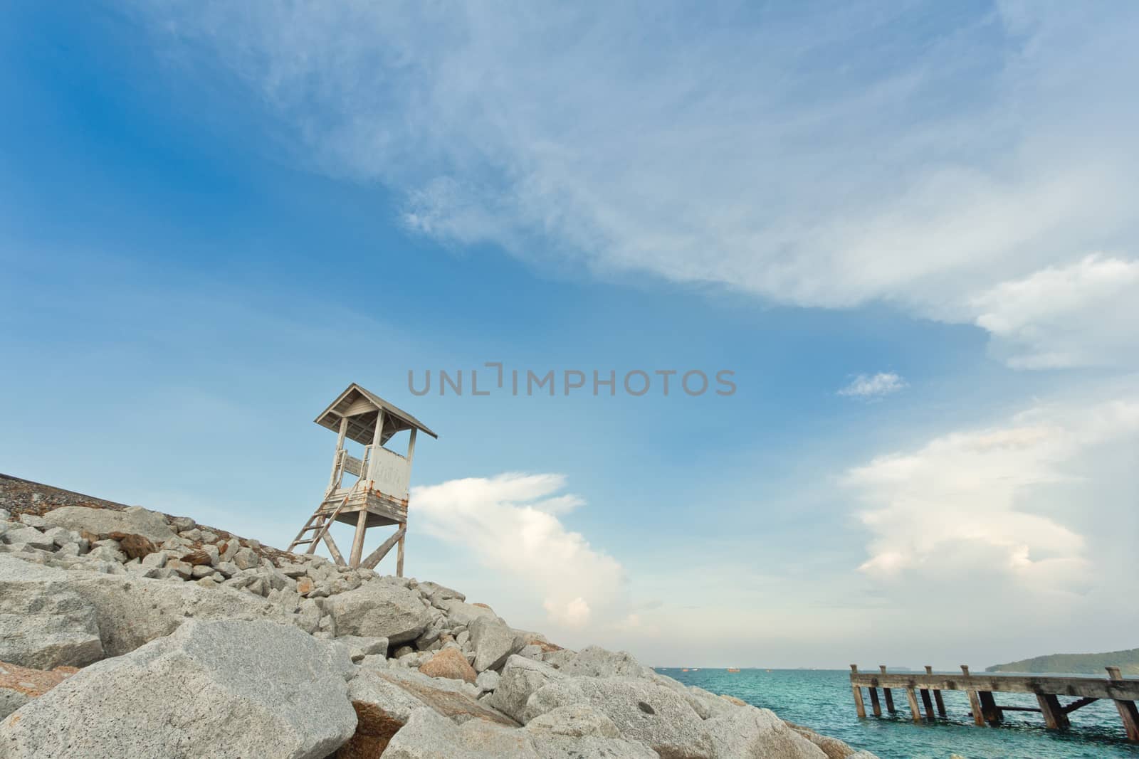 View point at rocky beach and blue sky