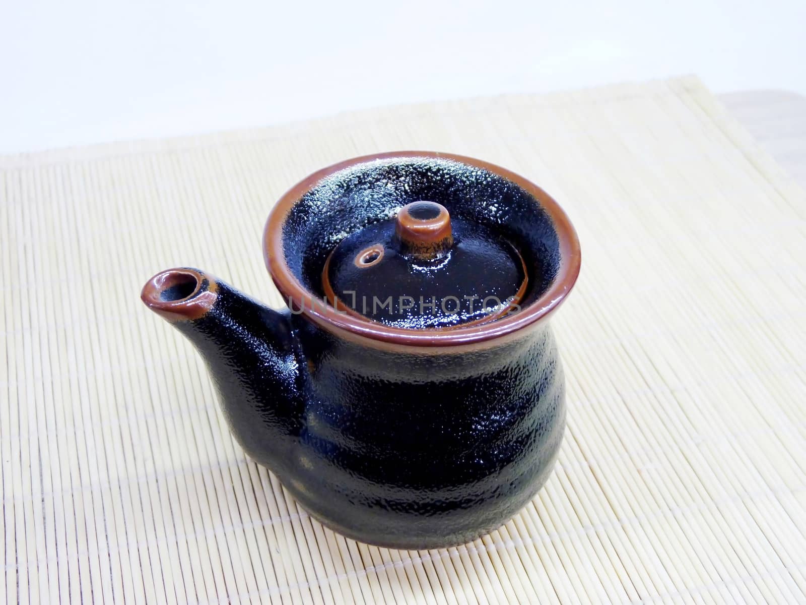 Sauce-boat for a land with a cover from a collection of ceramic Japanese ware	