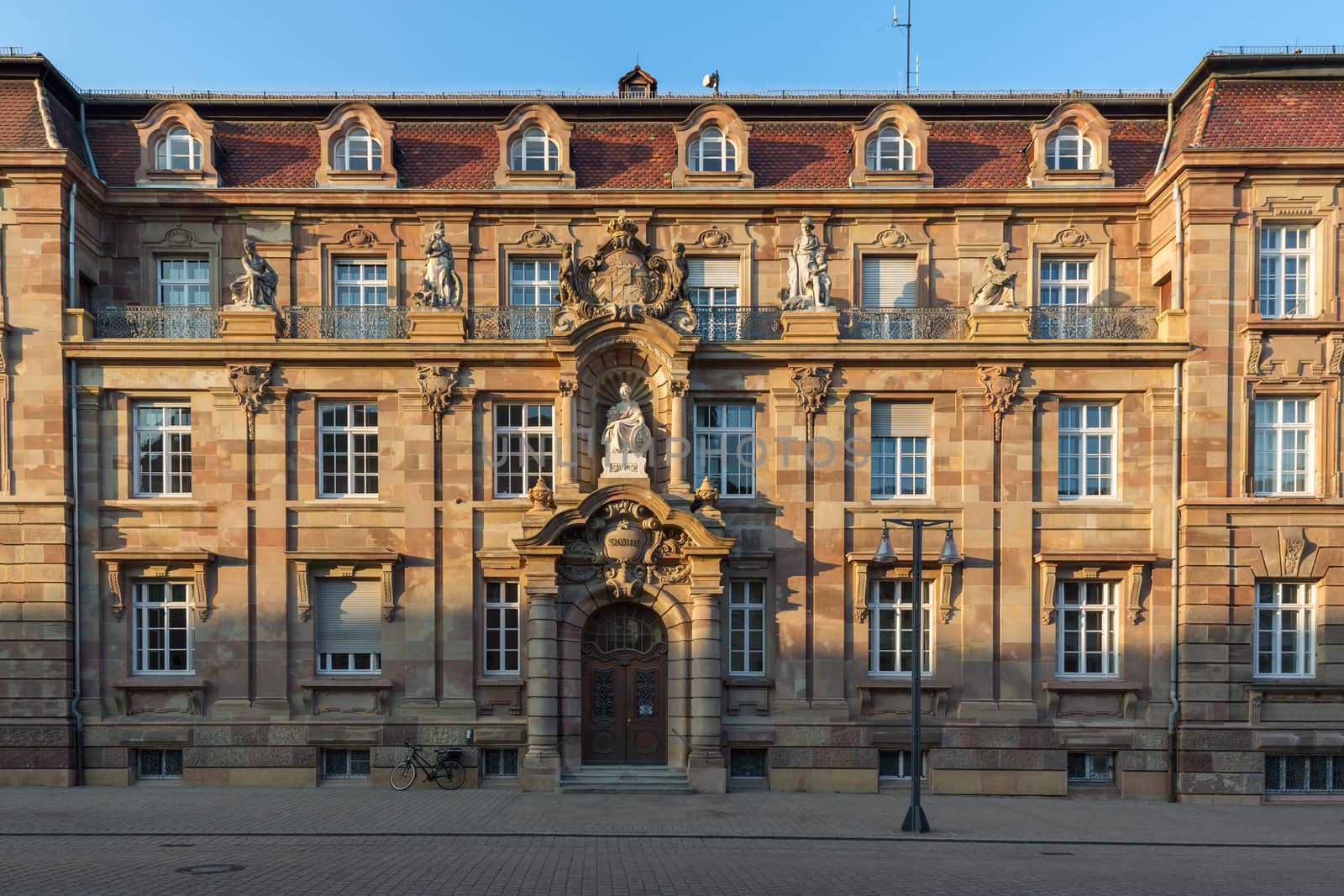 Historic building in Speyer in evening light, Germany by fisfra