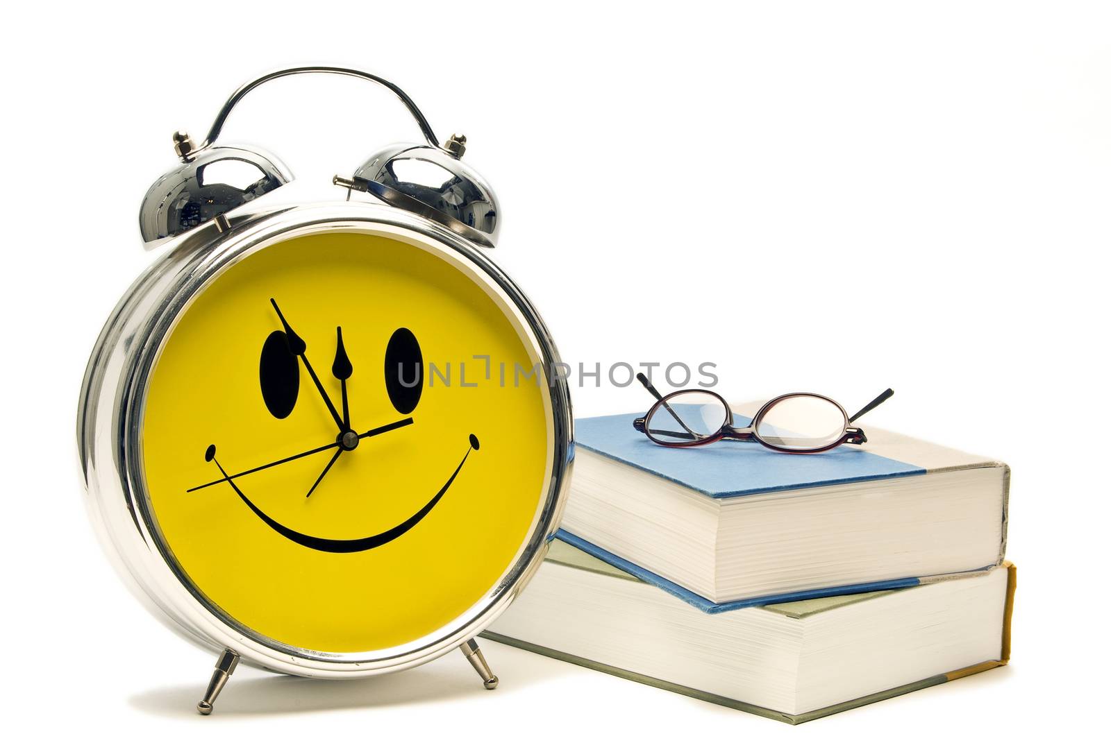 Back To School Concept With Books And Happy Clock Isolated by stockbuster1