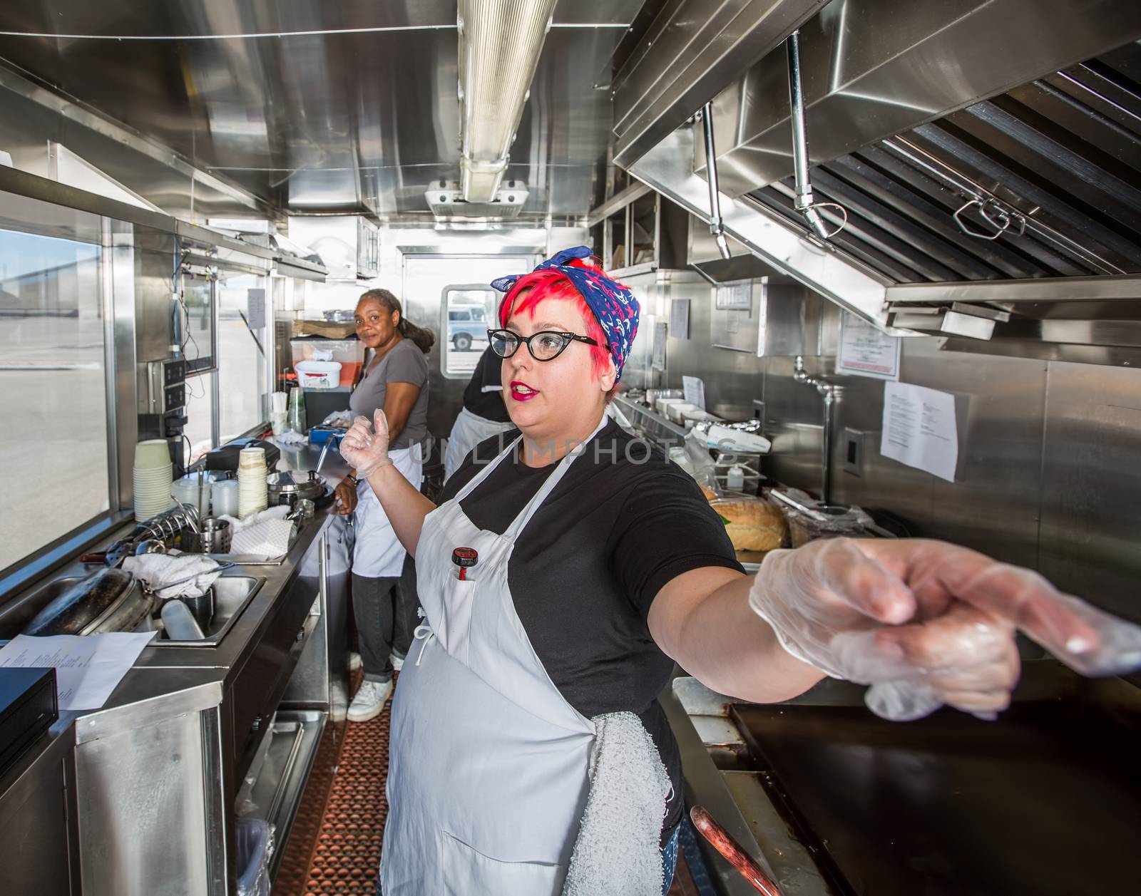 Chef Directs Crew on Food Truck by Creatista