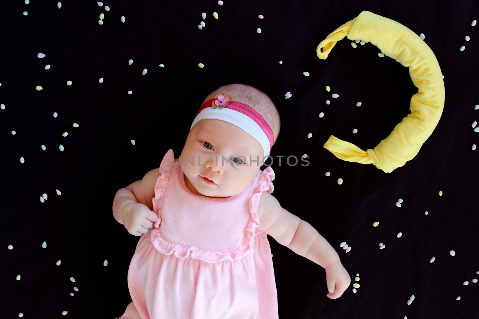 Beautiful small kid girl in pink dress