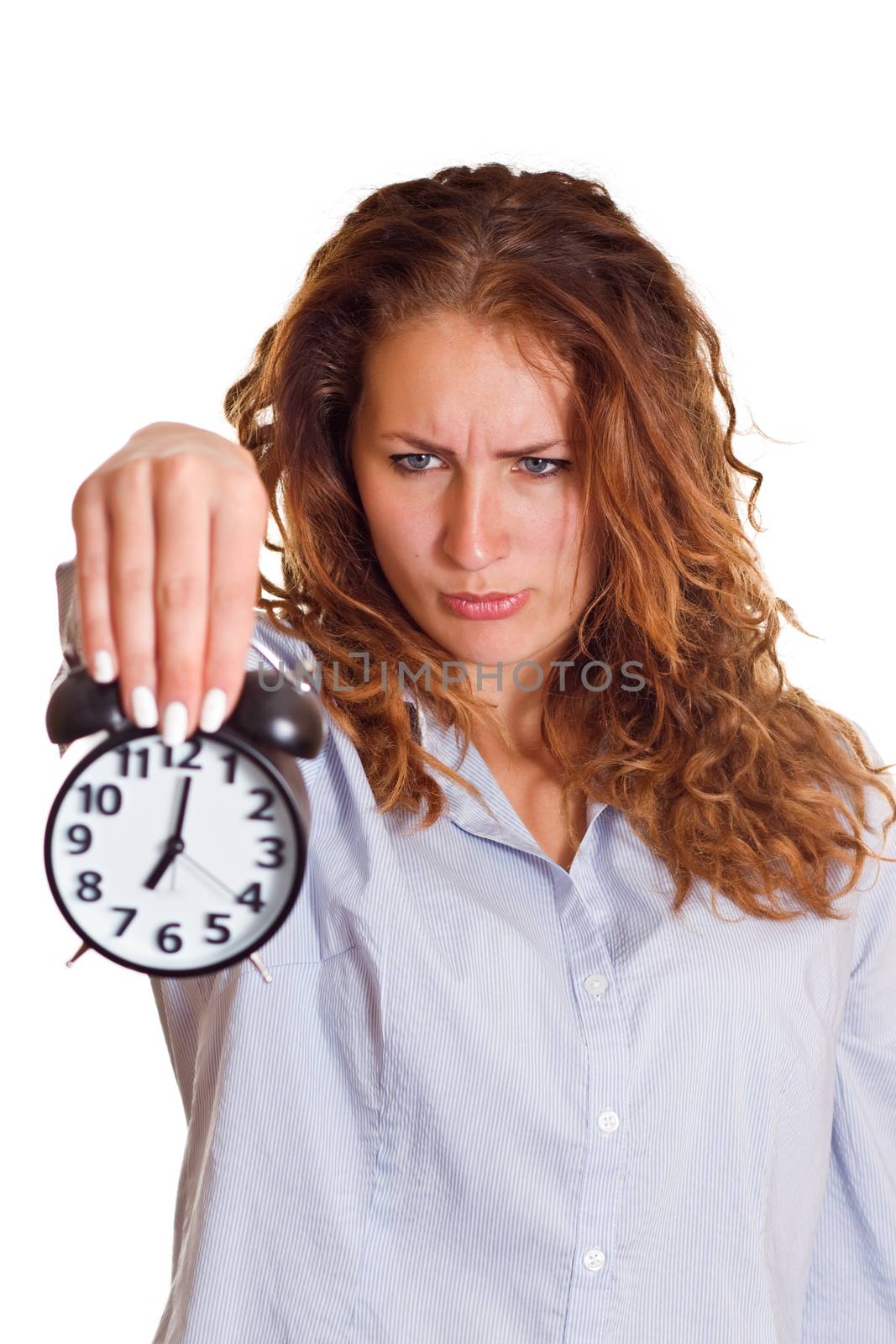 Time concept. Business woman with alarm clock, isolated on white background.