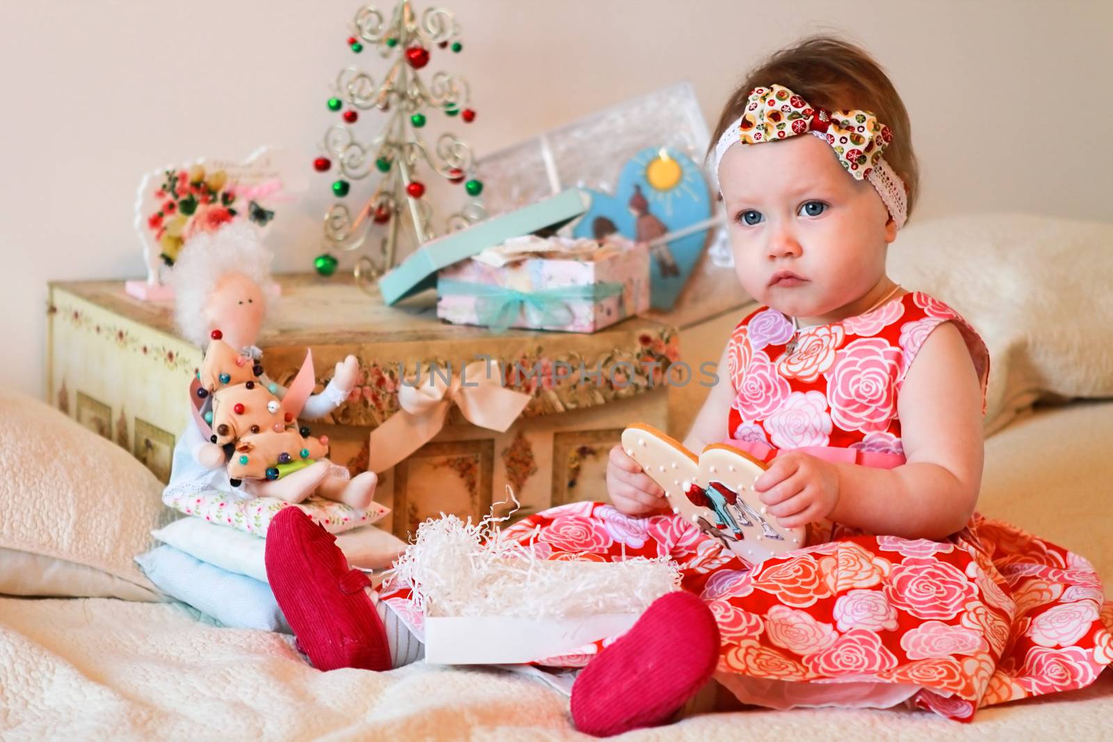 Portrait of little girl with a gifts