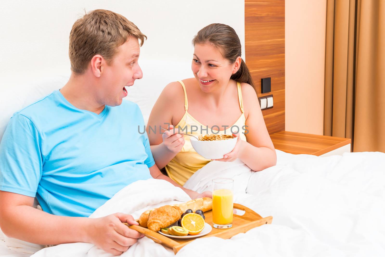 woman and man in a cheerful breakfast