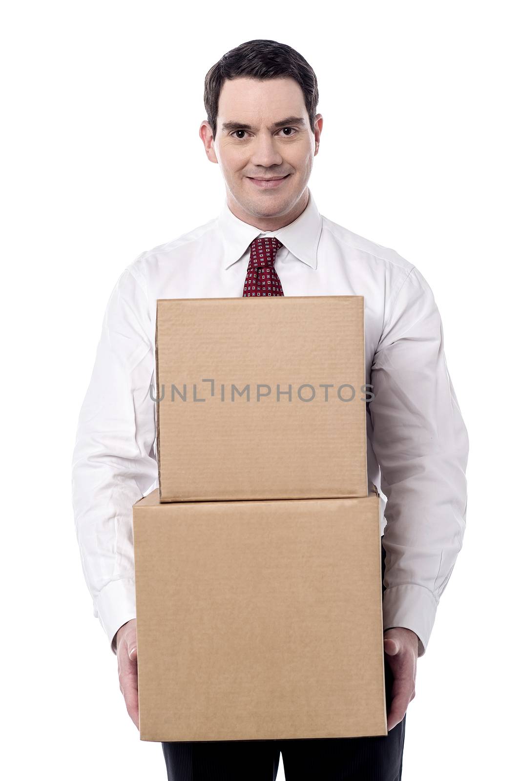 Corporate man carrying a cardboard boxes in hand