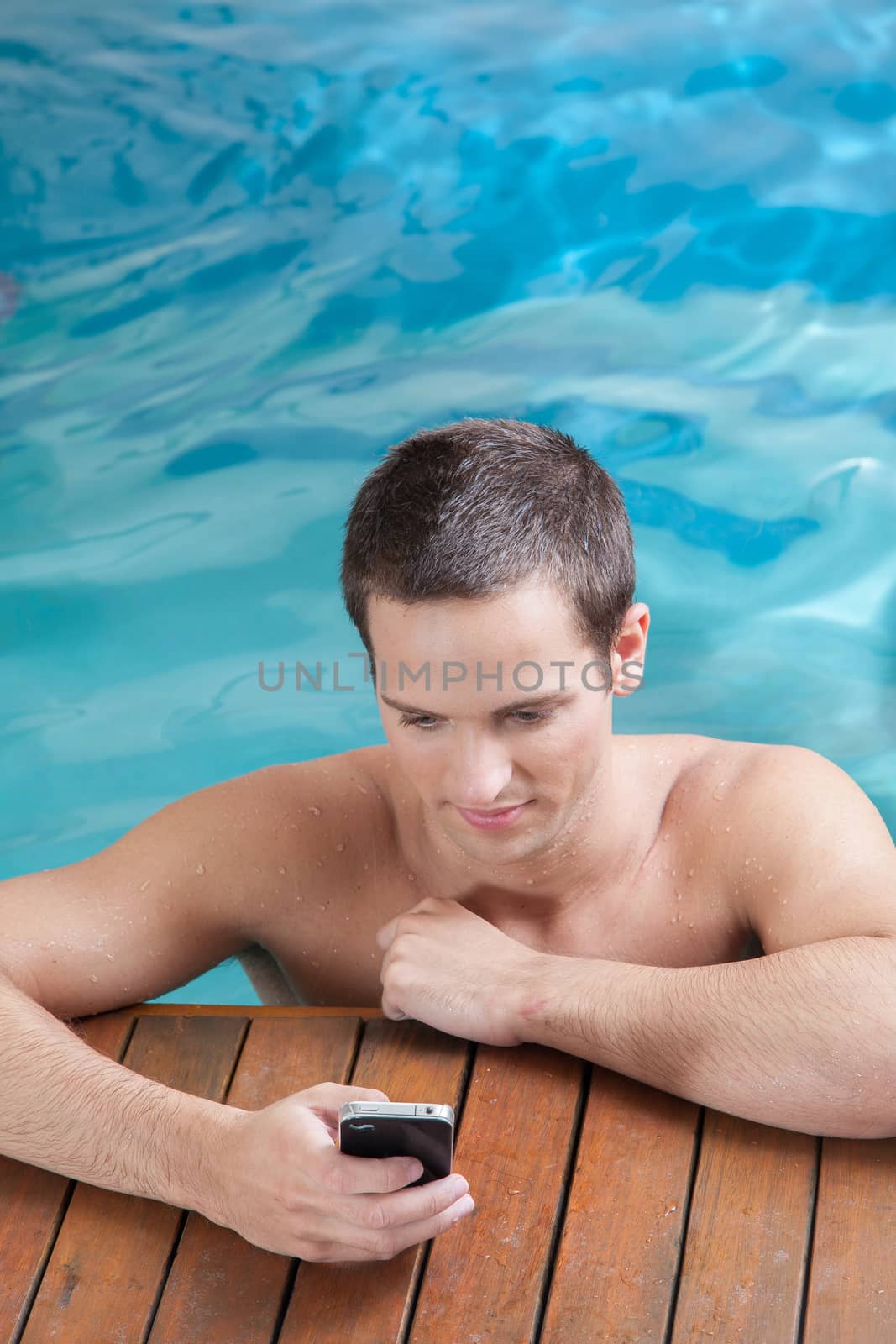 Man sending a message inside the pool