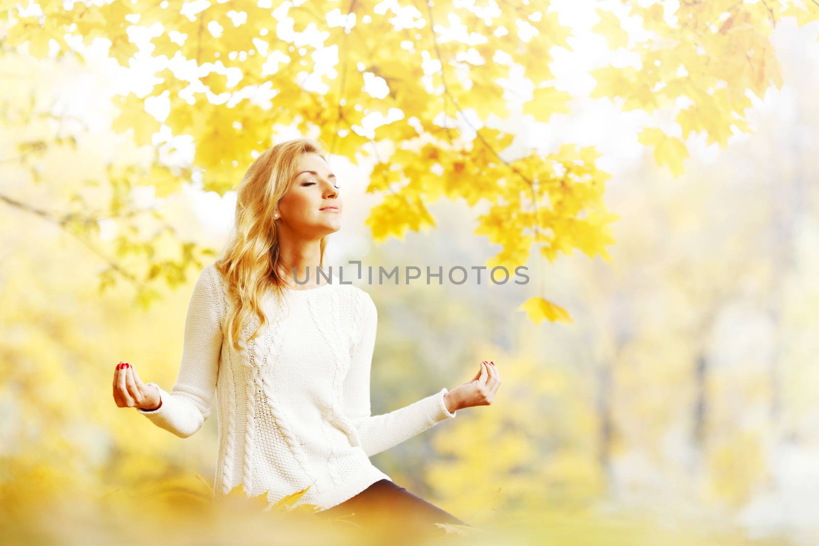 Yoga woman in autumn park by Yellowj