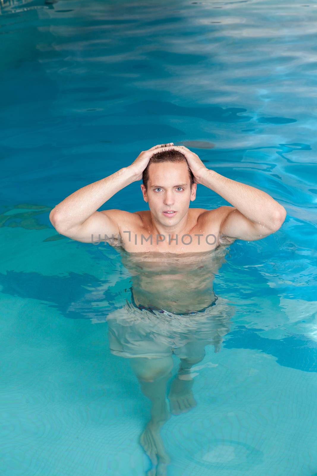Man relaxed inside the pool