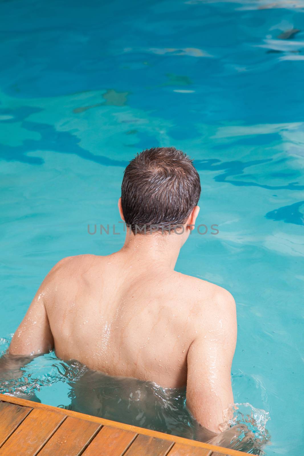 Man back swimming