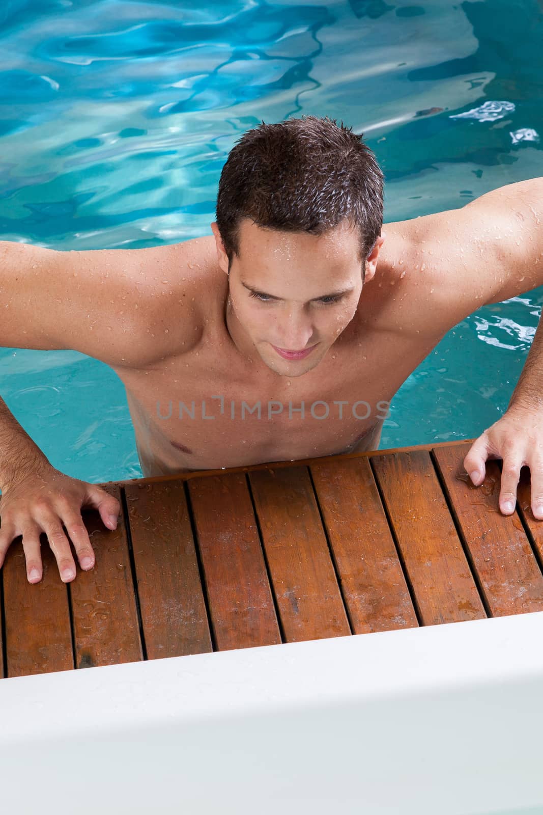 Guy coming out of the pool