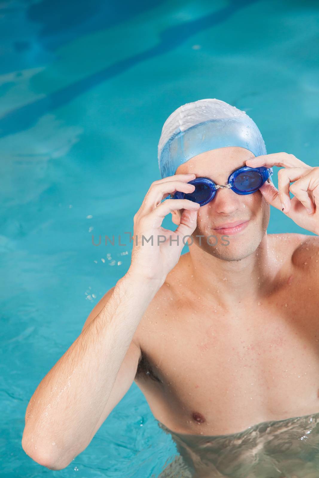 Man putting on goggles by ifilms