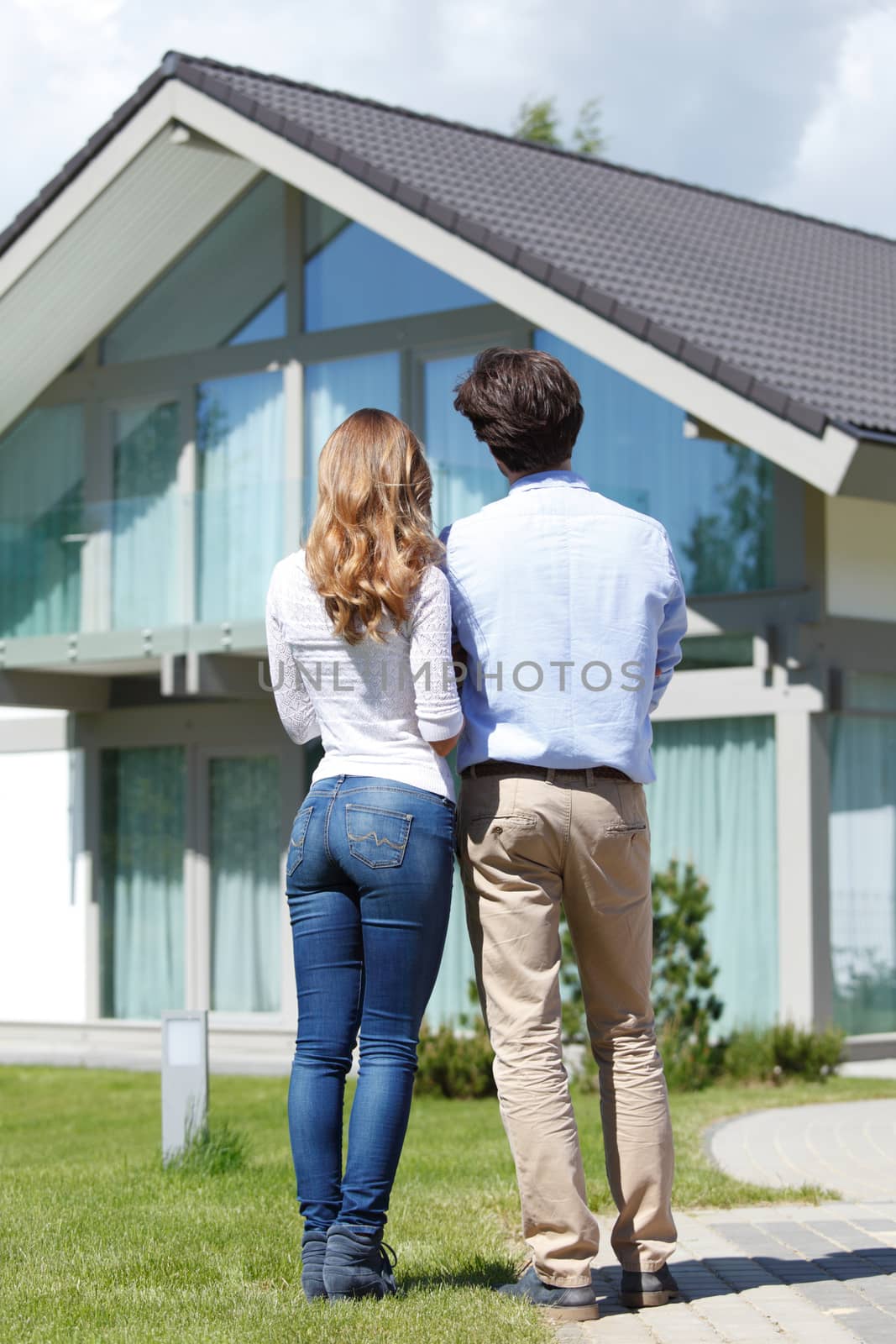 couple looking at house by ALotOfPeople