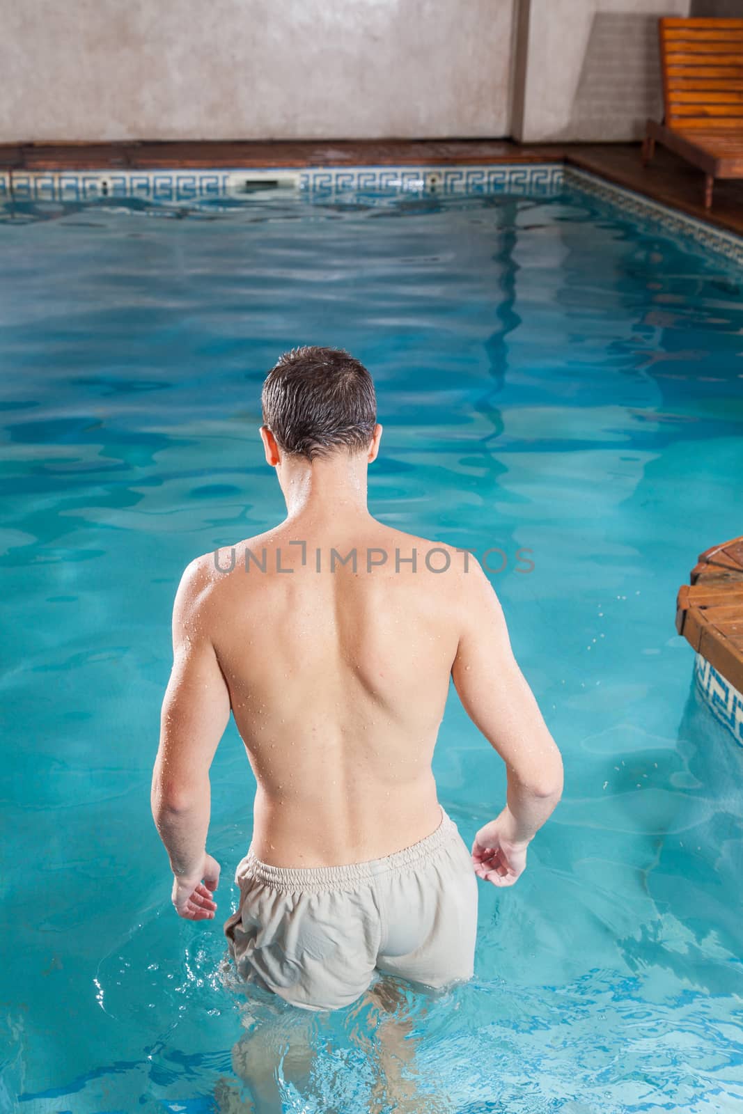 Man back enter the pool